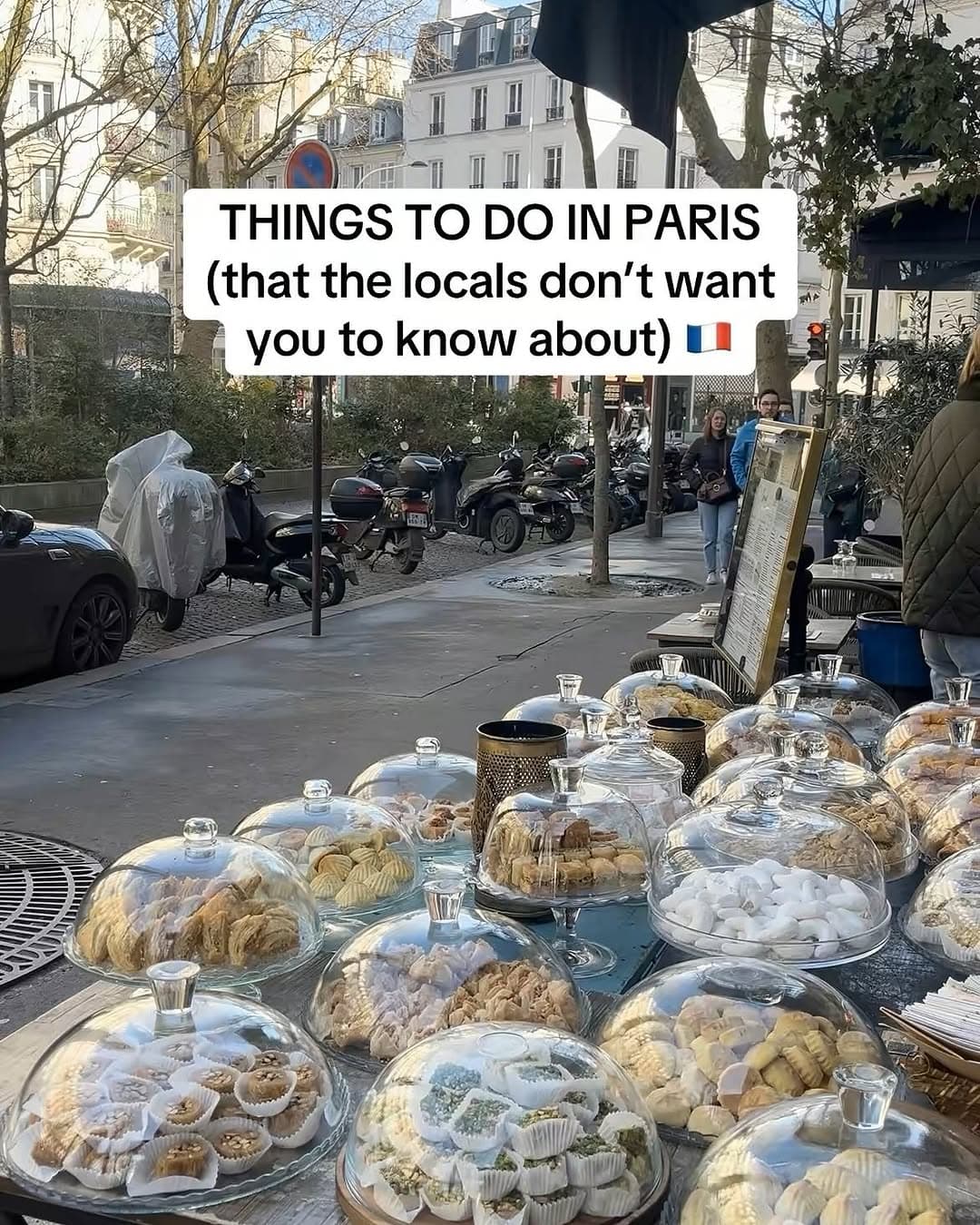Parisian Landmarks And A Parisian Cafe